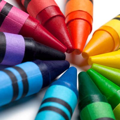 This is a close up photograph of colorful crayon tips pointing towards each other.Click on the links below to view lightboxes.